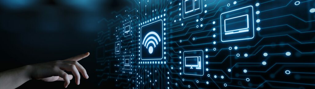 IT Profiessional pointing to a network map, including business wifi networking symbol